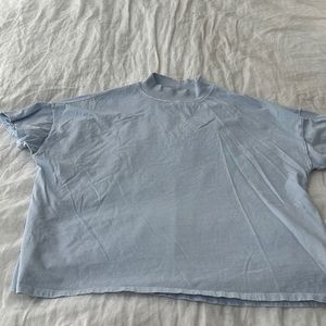 Free People lightweight loose baby blue top. Size Large.